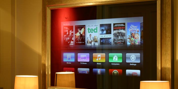 Television displaying home cinema controls disguised within a picture frame